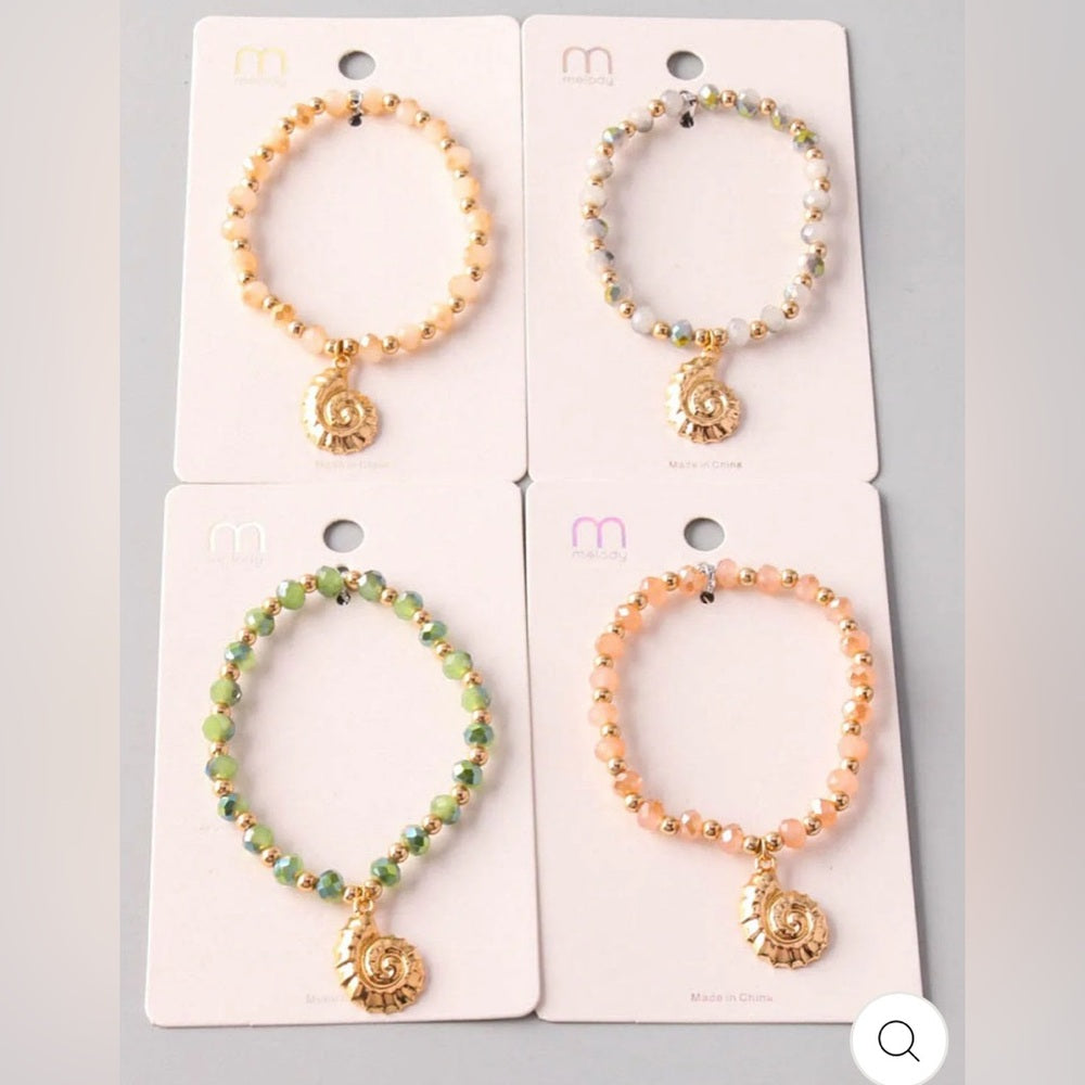 332. Elegant Beaded Bracelet with Gold Shell Accent