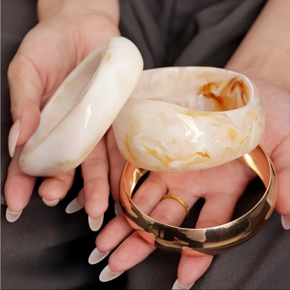 470. Gold and Cream Resin Bangle Set