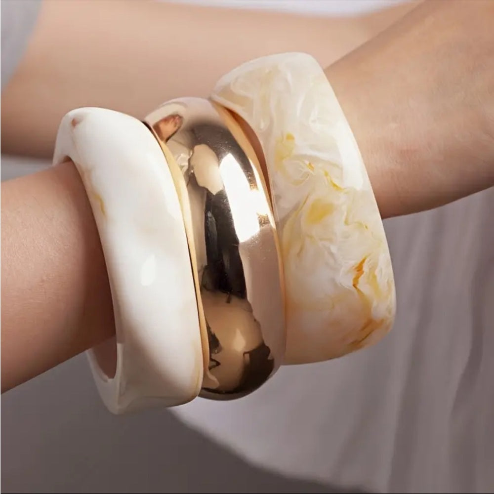 470. Gold and Cream Resin Bangle Set