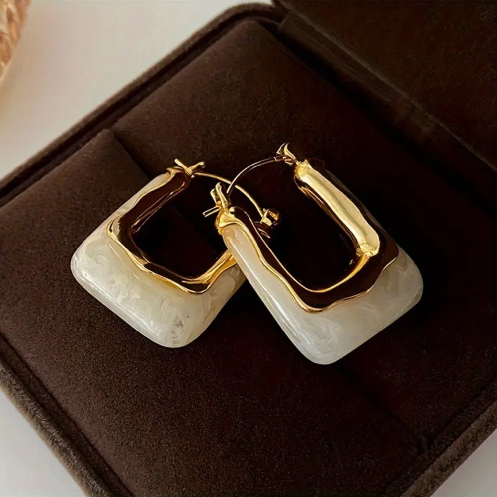 473. Gold and Cream Resin Earrings