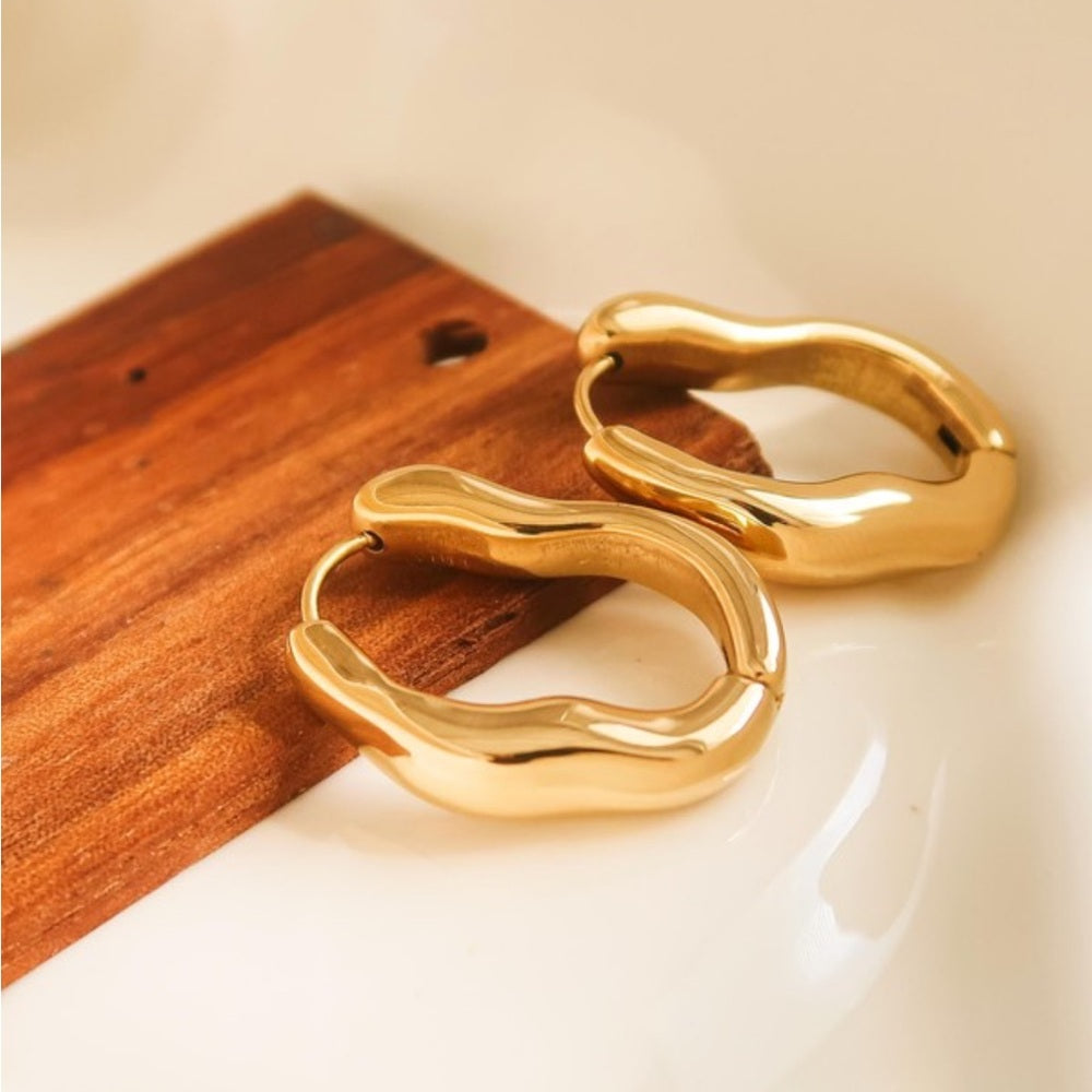 A61. 18k Gold Non-tarnish Oval Hoop Earring