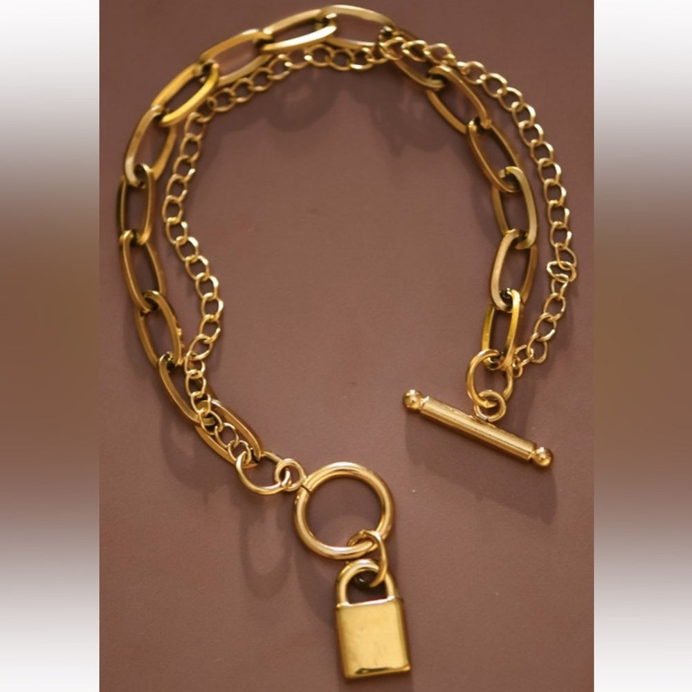 A72. 18k Gold Stainless Steel Chain Bracelet with Lock Charm