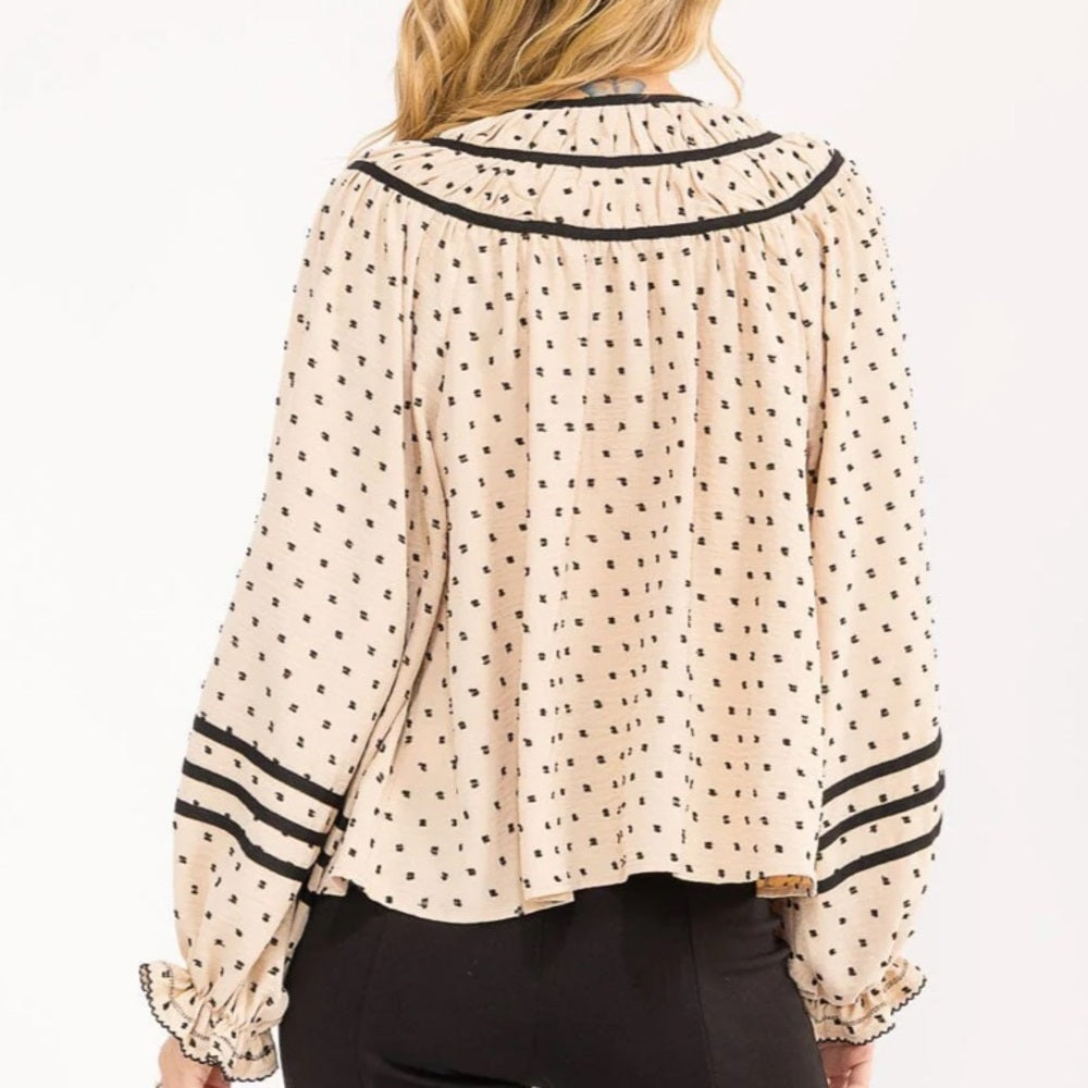 A111. Polka Dot Blouse with Black Accents