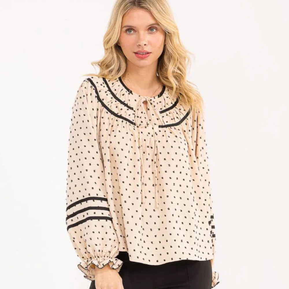 A111. Polka Dot Blouse with Black Accents