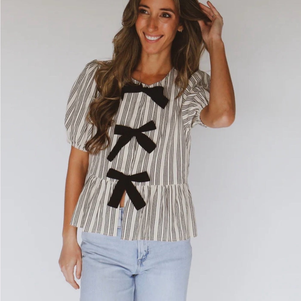 A292. Striped Puff Sleeve Top with Black Bow Accents
