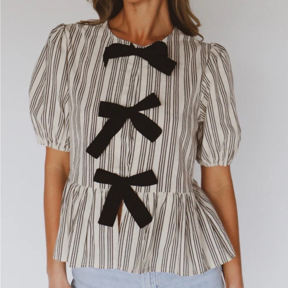 A292. Striped Puff Sleeve Top with Black Bow Accents