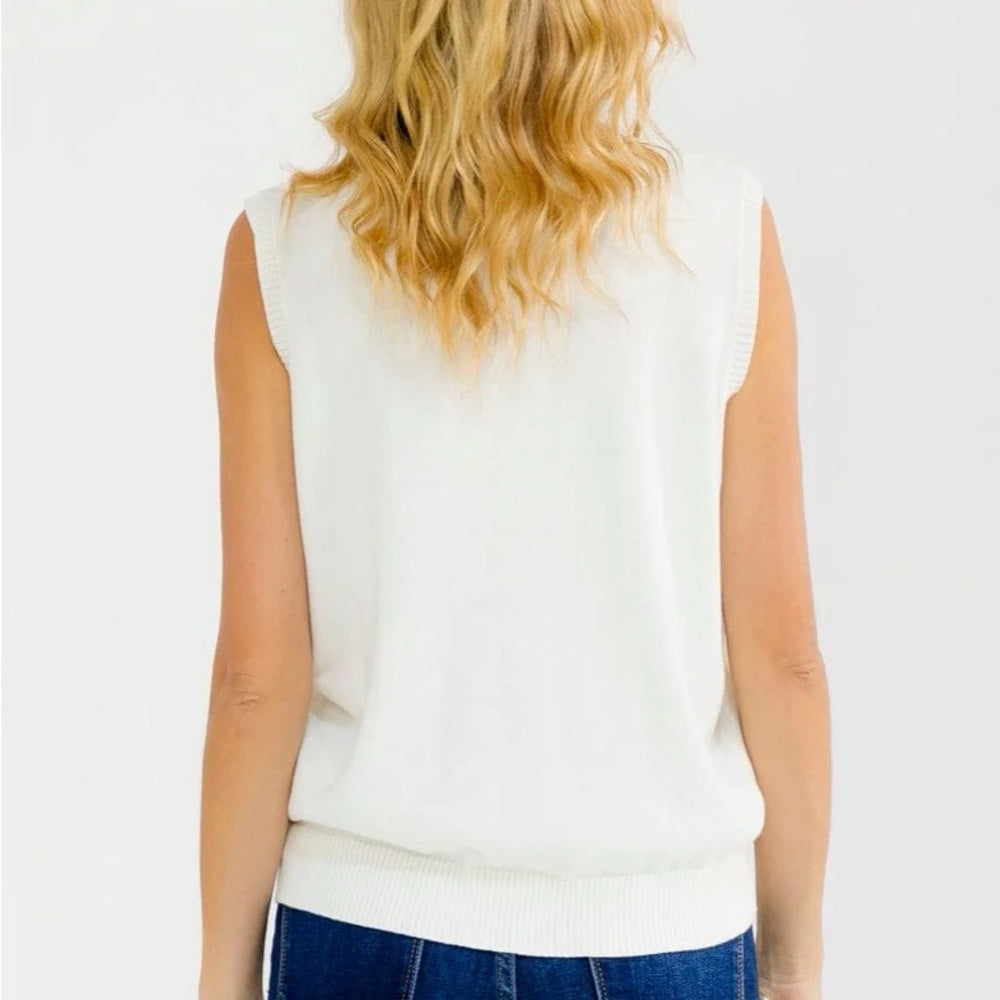 A293. Cream Sleeveless Knit Top with Boot Design