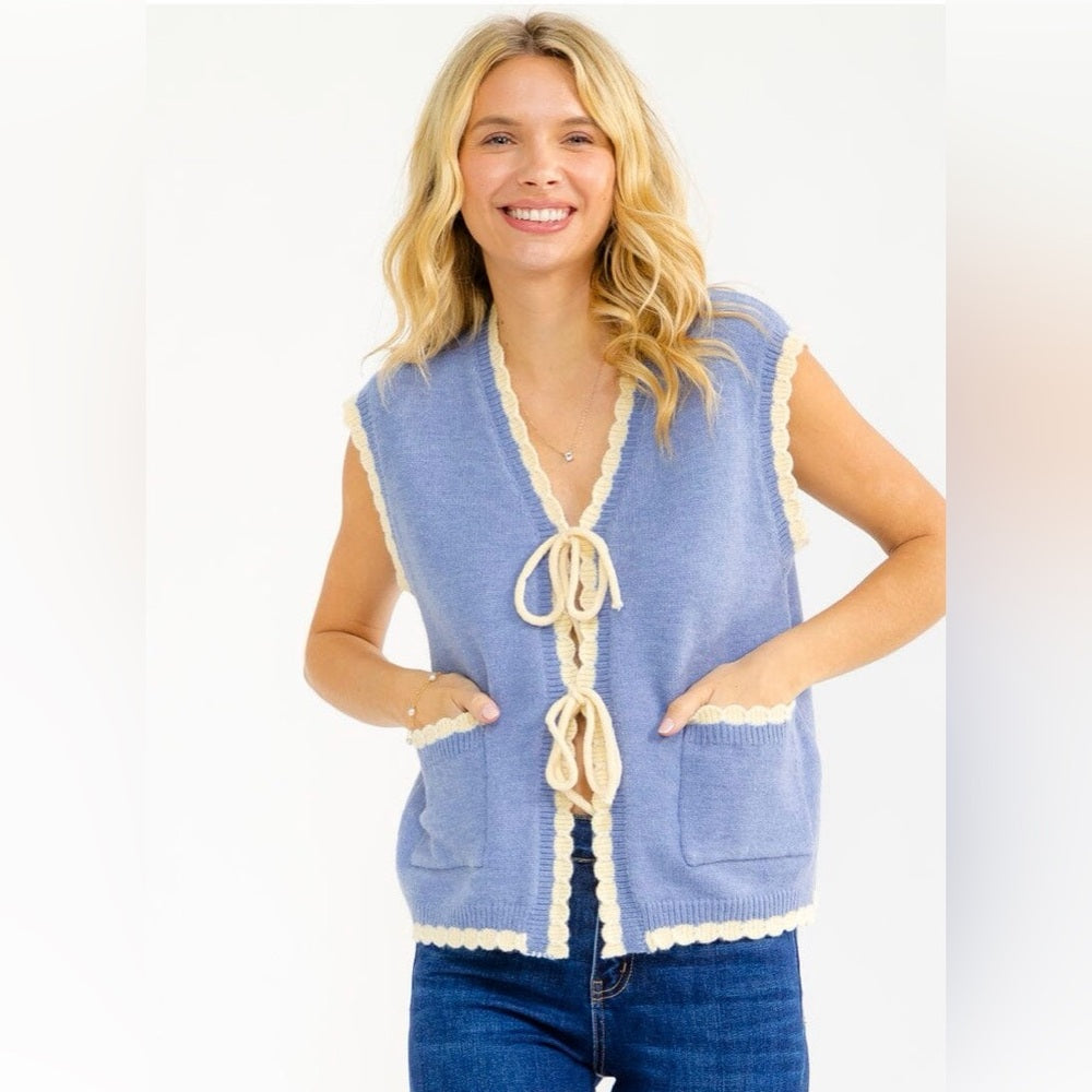 A295. Blue and Cream Knit Bow Front Vest