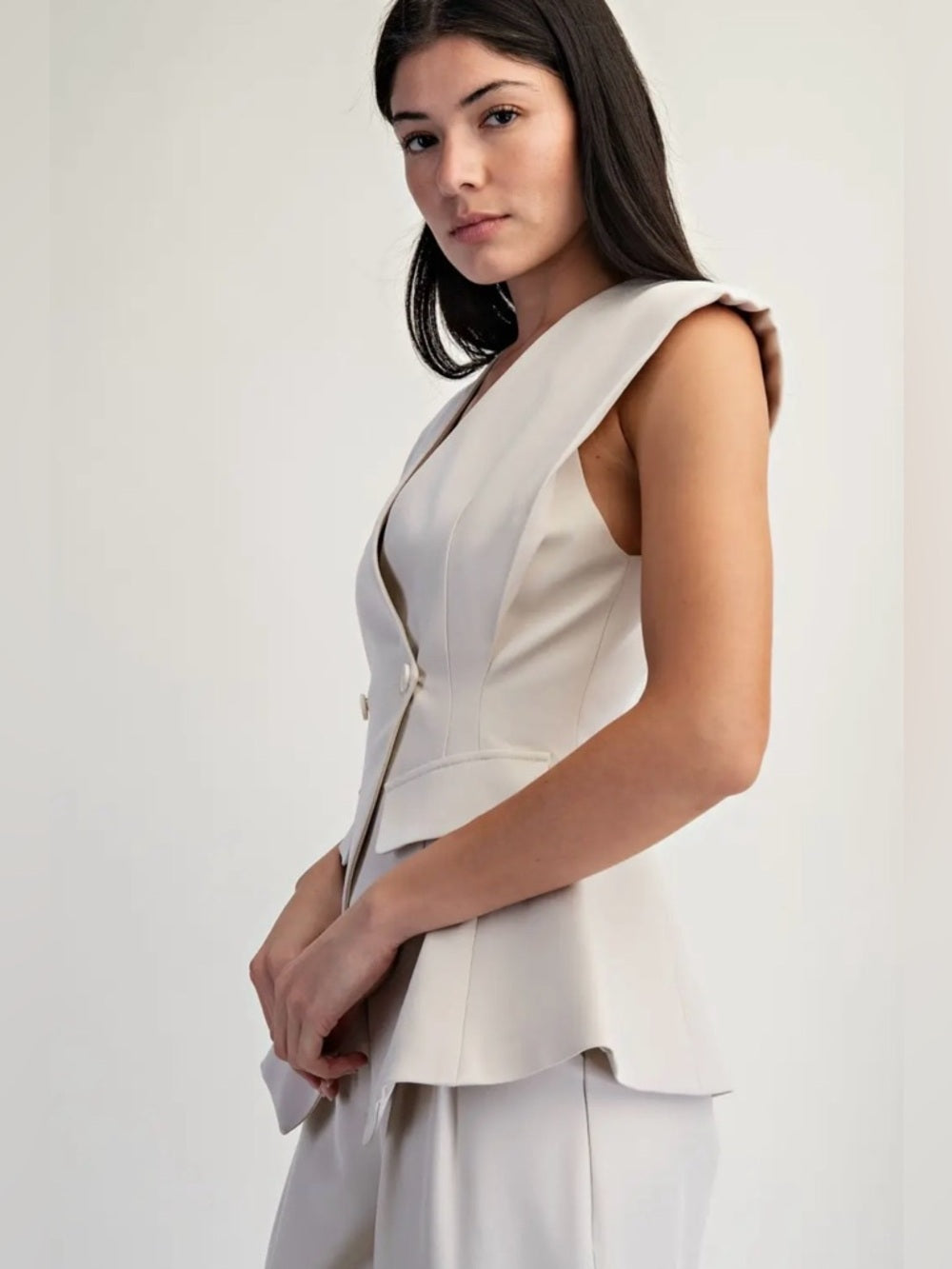 A340. Sleeveless Ivory Peplum Blazer & Wide-Leg Pants Set