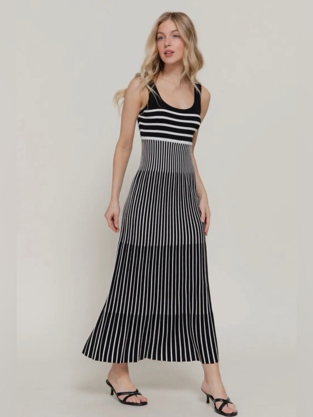 A377. Black and White Striped Knit Maxi Dress