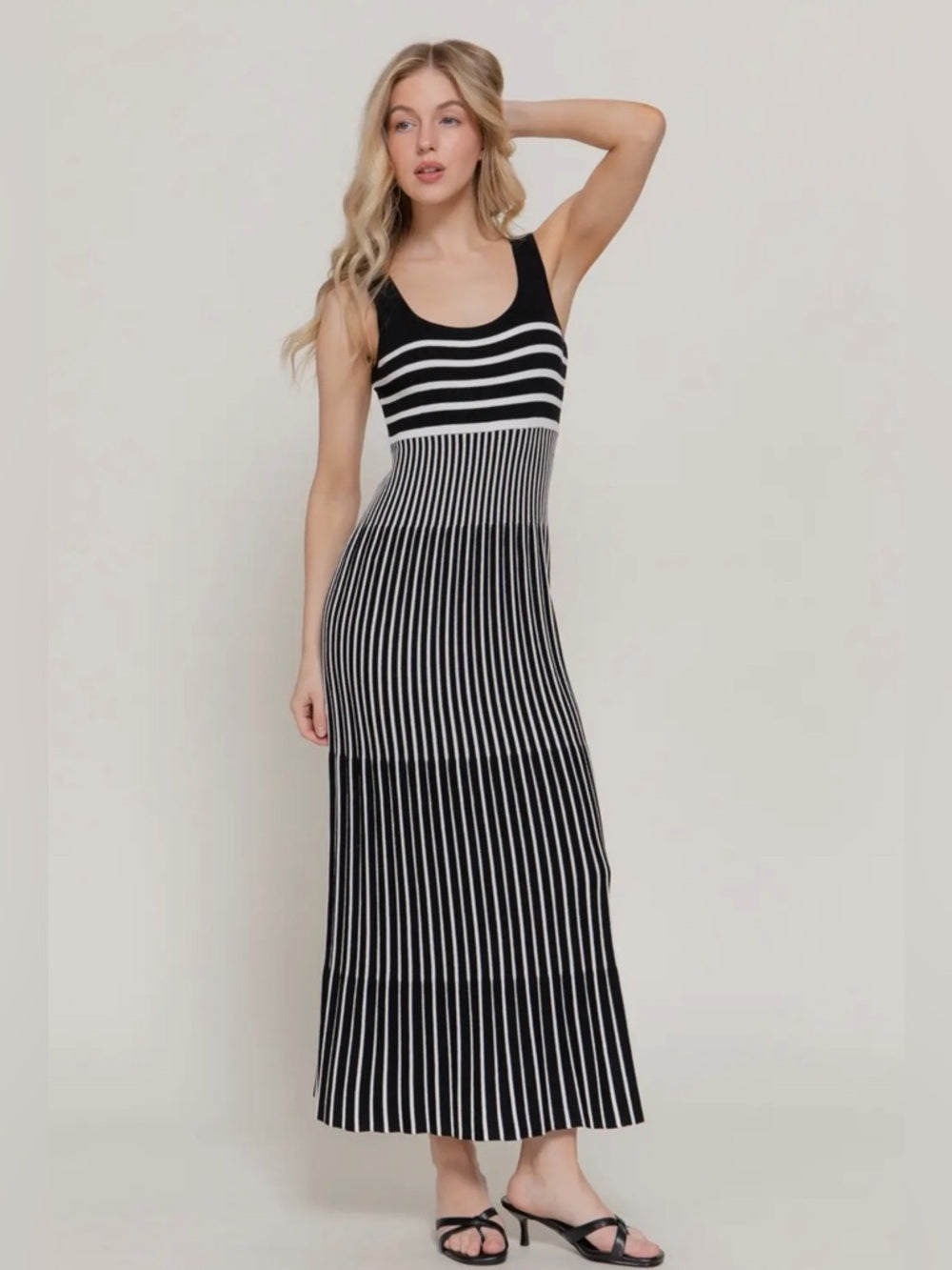 A377. Black and White Striped Knit Maxi Dress
