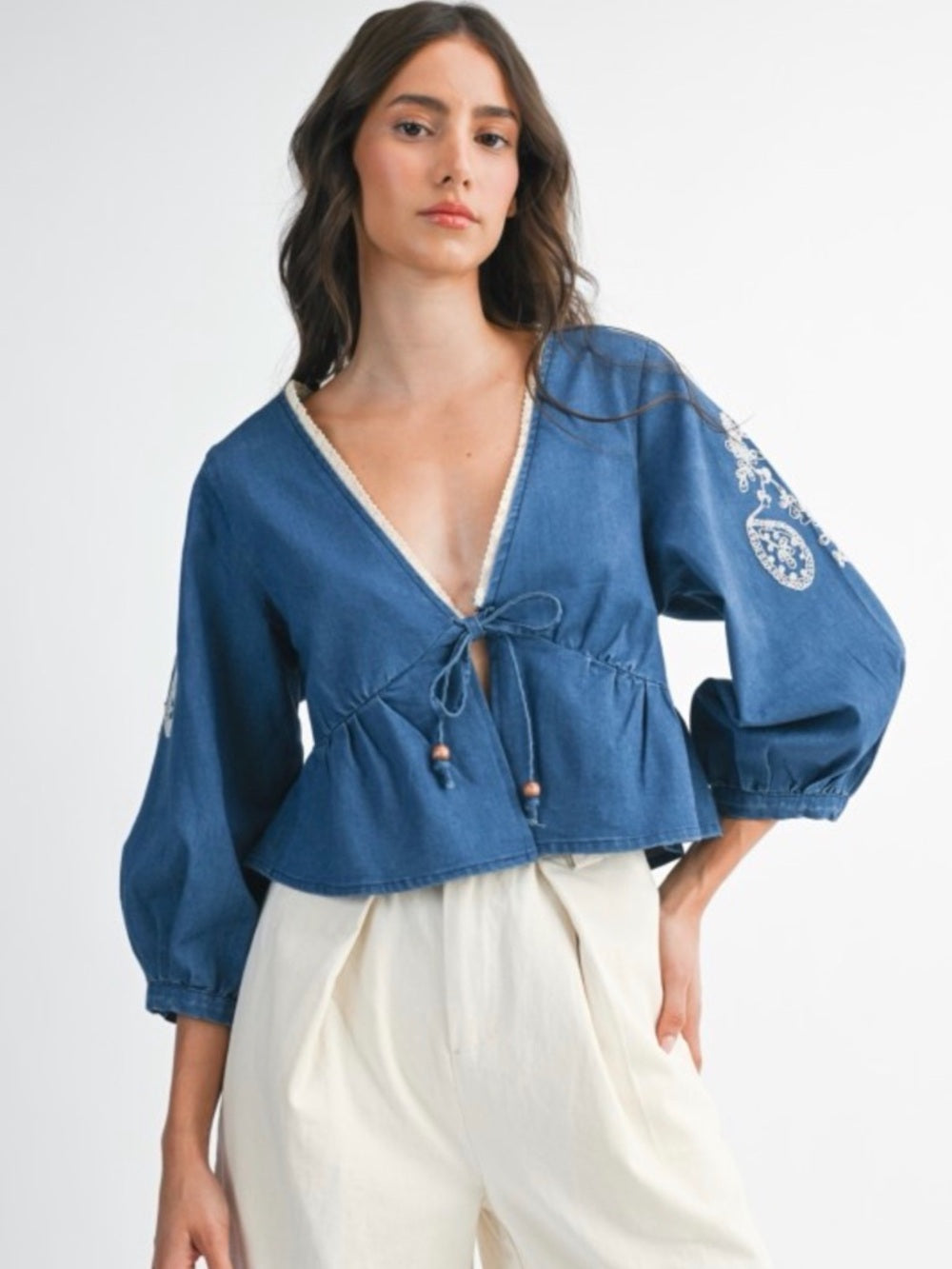 A380. Embroidered V-Neck Peplum Top - Blue