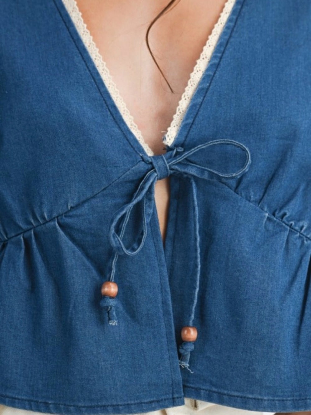 A380. Embroidered V-Neck Peplum Top - Blue