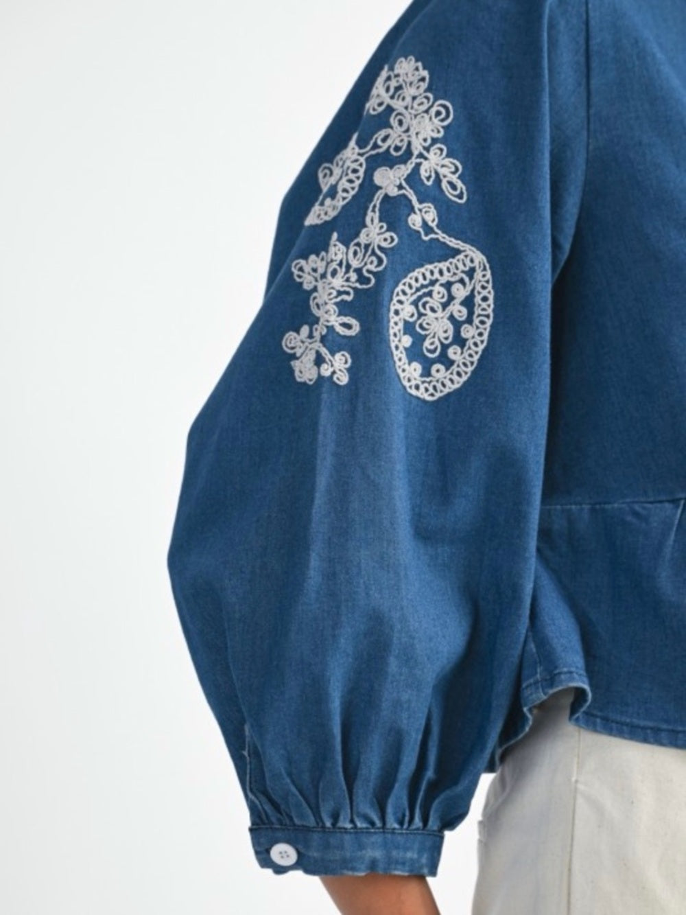 A380. Embroidered V-Neck Peplum Top - Blue