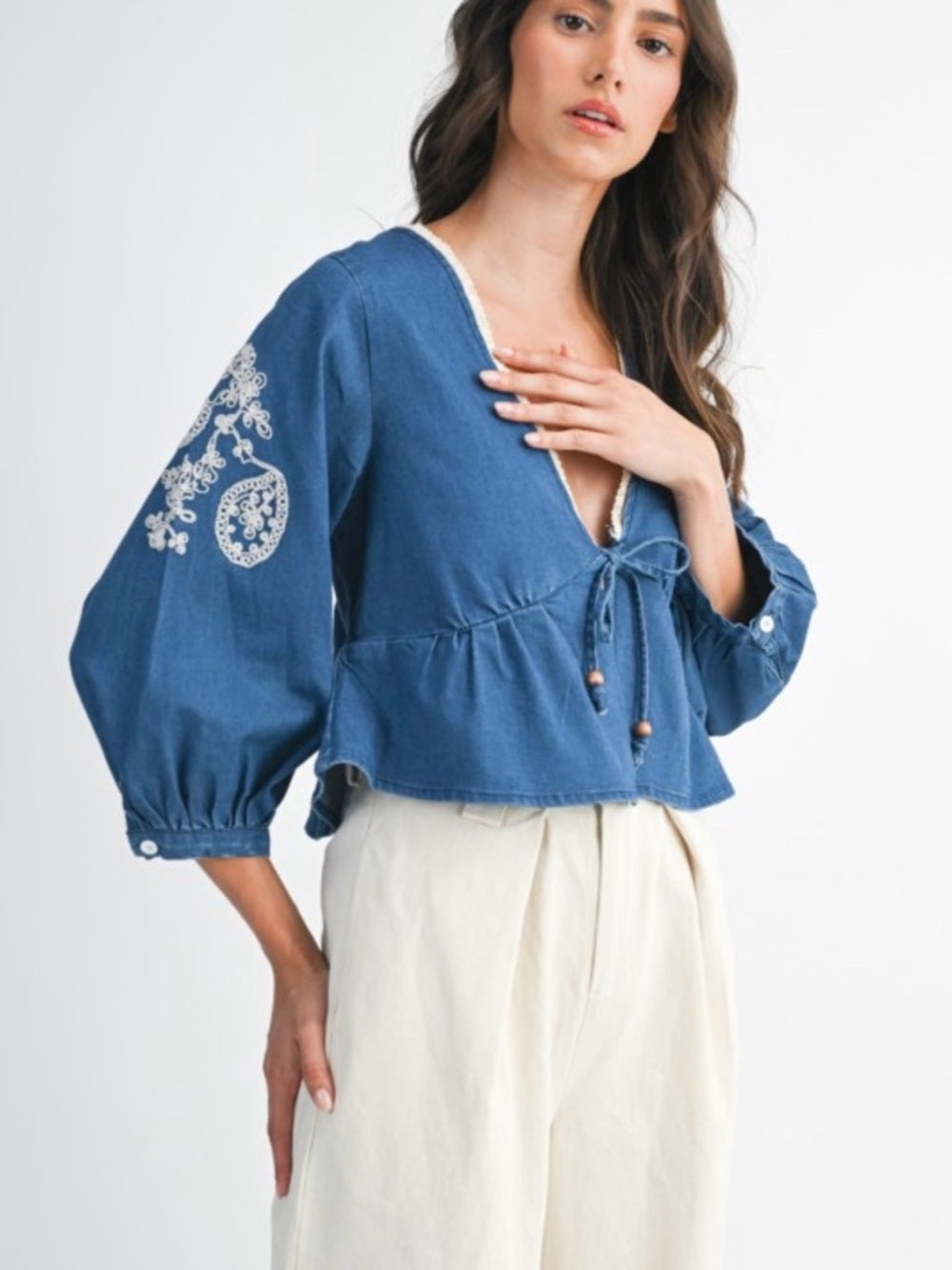 A380. Embroidered V-Neck Peplum Top - Blue