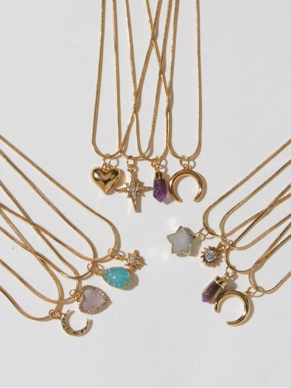 A394. Luna Norte Spring Gold 4 Strand Charm Necklace Set