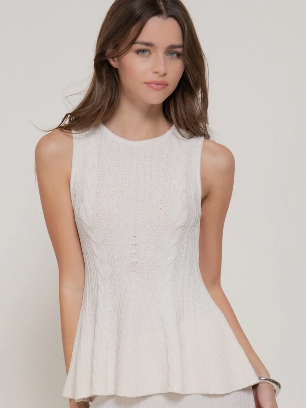 A445. Cream Sleeveless Cable Knit Peplum Top