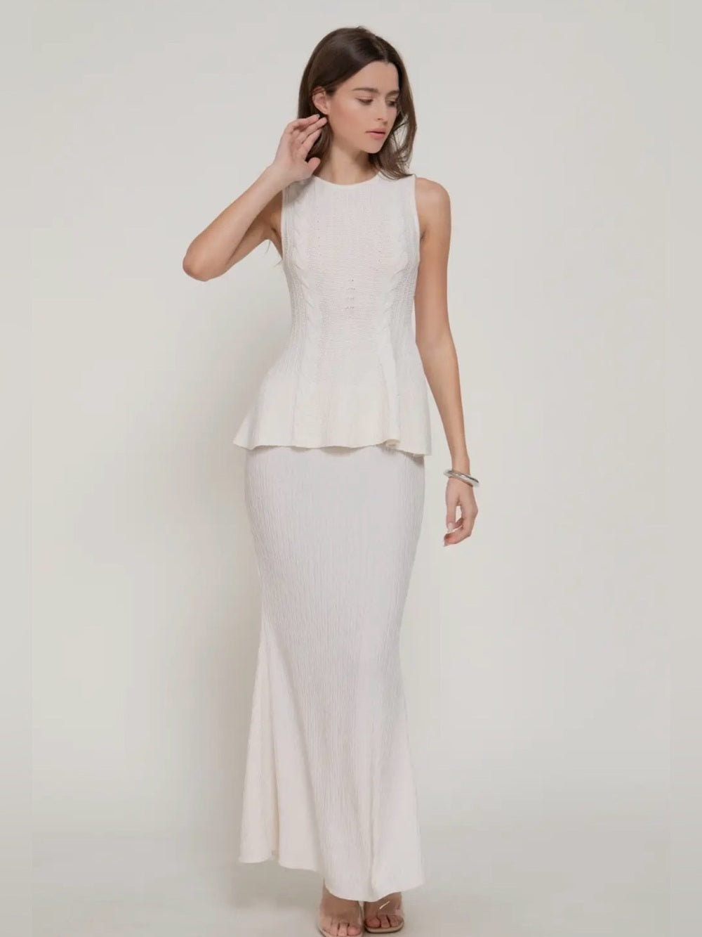 A445. Cream Sleeveless Cable Knit Peplum Top