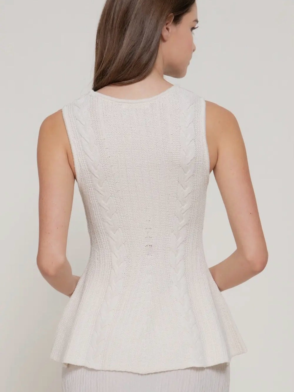 A445. Cream Sleeveless Cable Knit Peplum Top