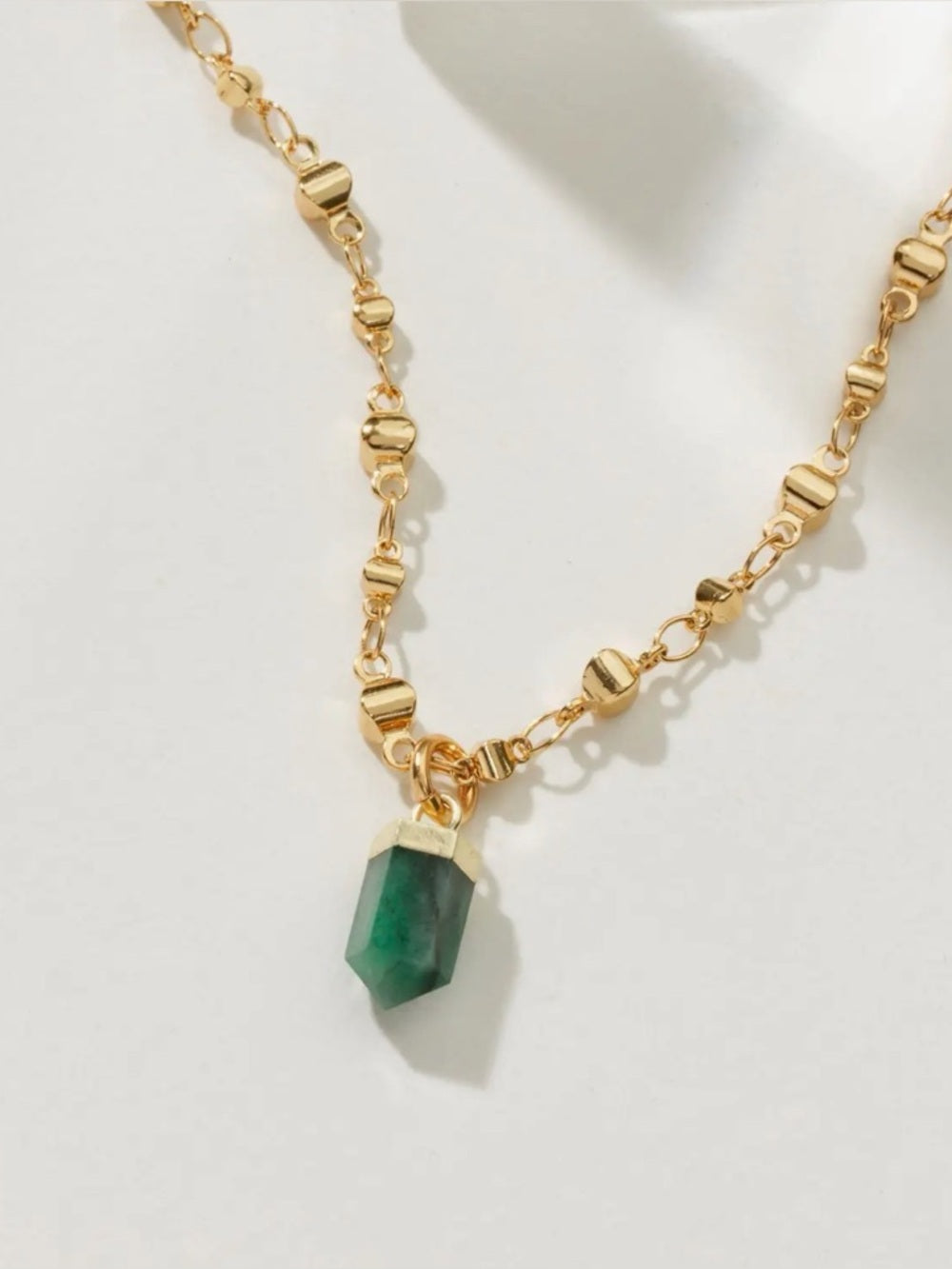 A397. Luna Norte Gold Necklace with Emerald Green Crystal Point Pendant