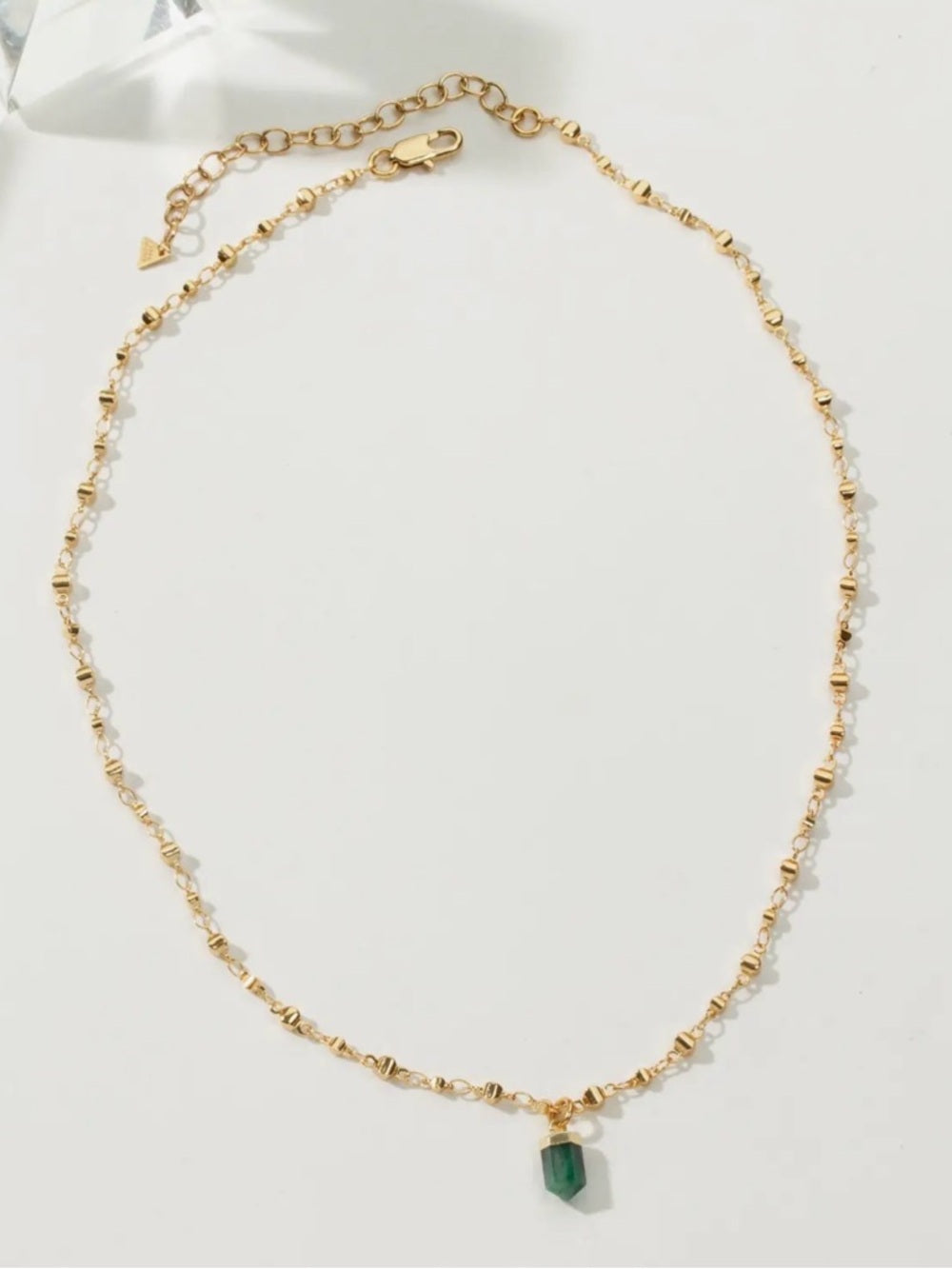 A397. Luna Norte Gold Necklace with Emerald Green Crystal Point Pendant