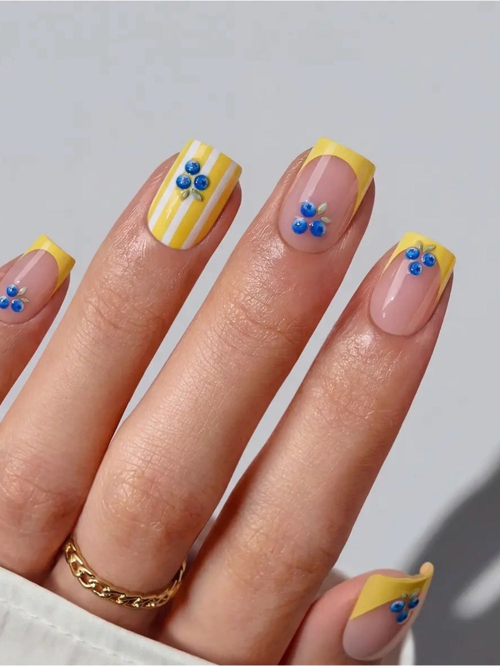 BTArtbox Nails Yellow French Tip Nail Art with Blue Floral Accents