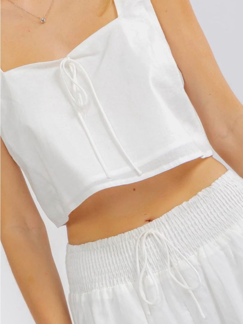 A600. Mable White Two-Piece Crop Top and Ruffle Shorts Set