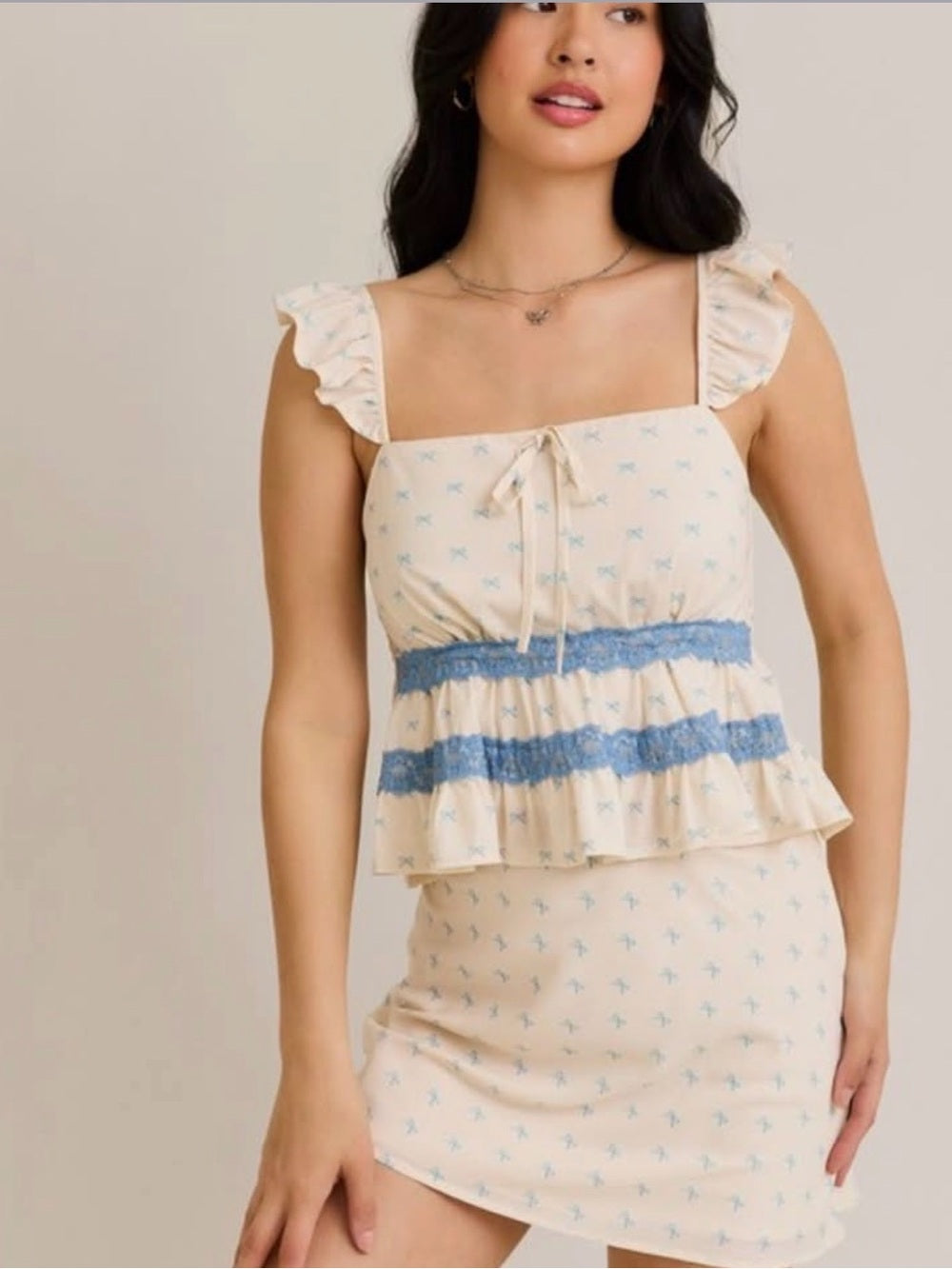 A624. Cream Skirt & Top Set with Blue Trim and Ruffle Straps