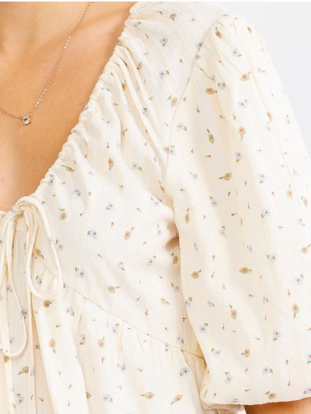 A632. Floral Puff Sleeve Blouse V-neckline and Open Back