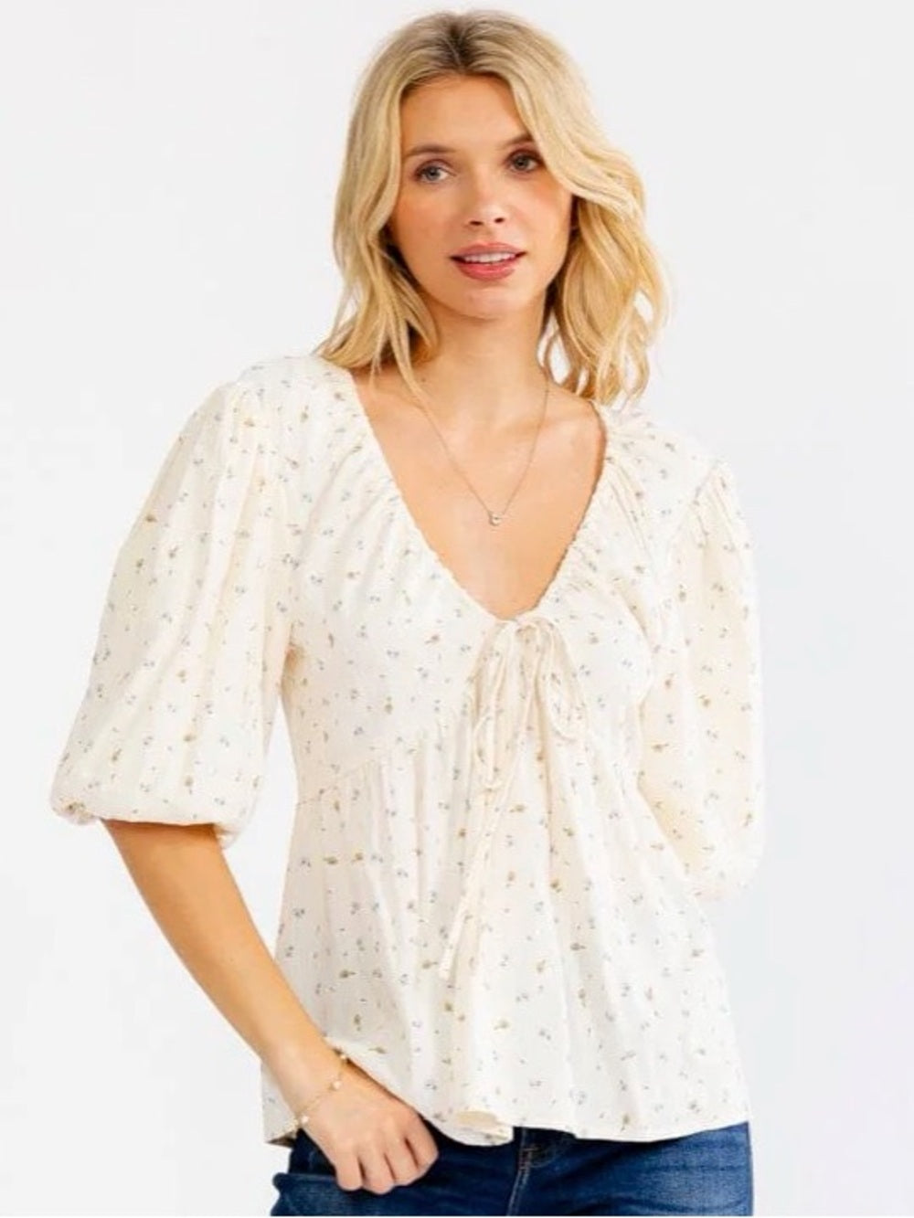 A632. Floral Puff Sleeve Blouse V-neckline and Open Back