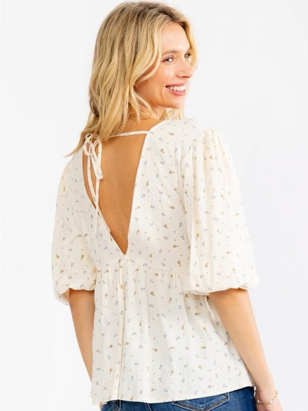 A632. Floral Puff Sleeve Blouse V-neckline and Open Back