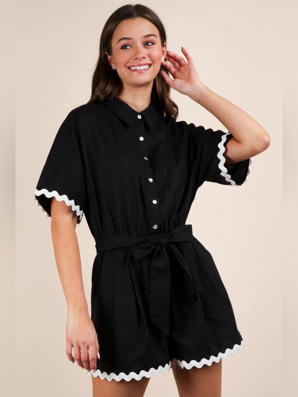 A677. Black Button-Up Romper with White Rickrack Trim
