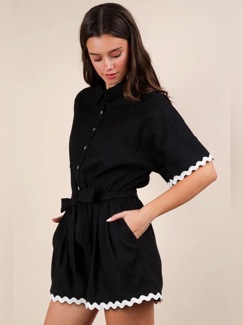 A677. Black Button-Up Romper with White Rickrack Trim