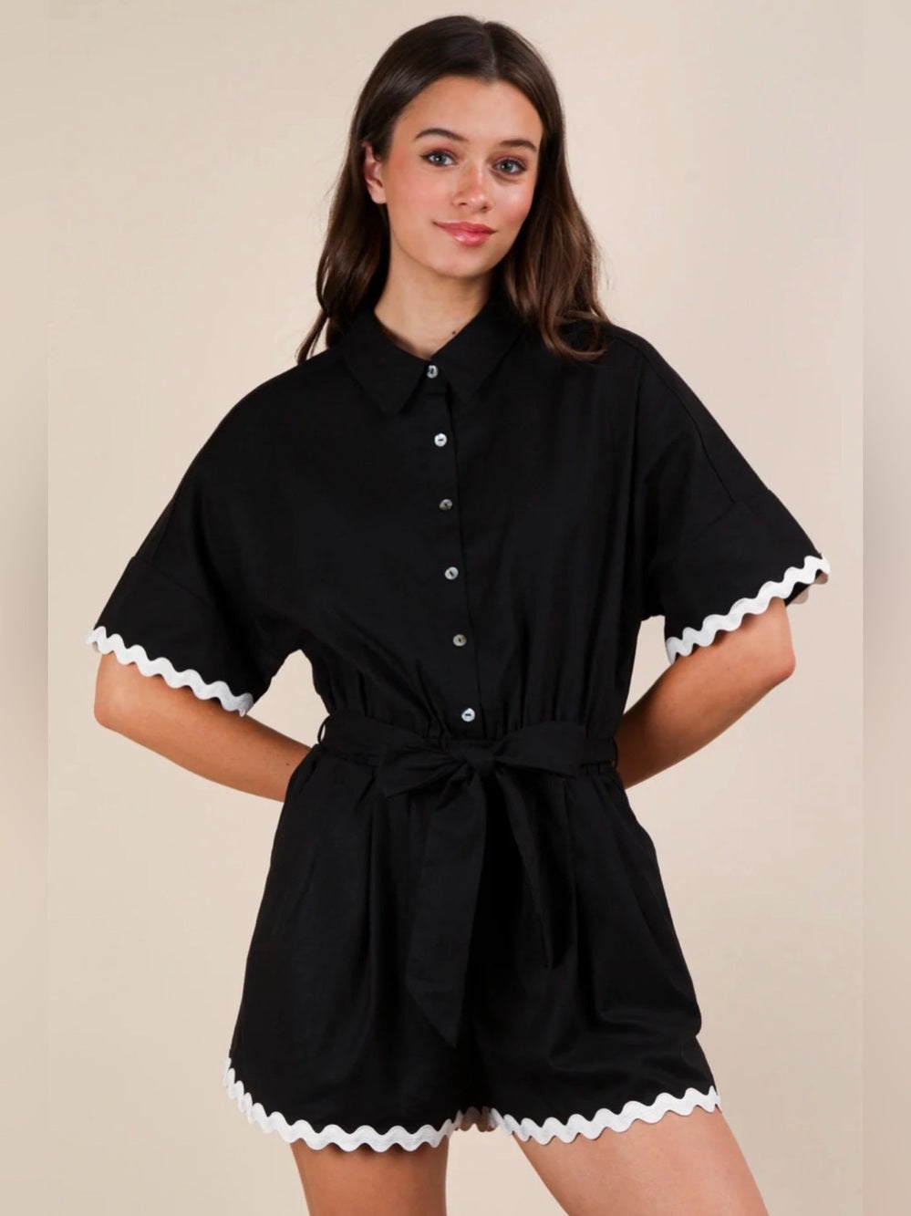 A677. Black Button-Up Romper with White Rickrack Trim