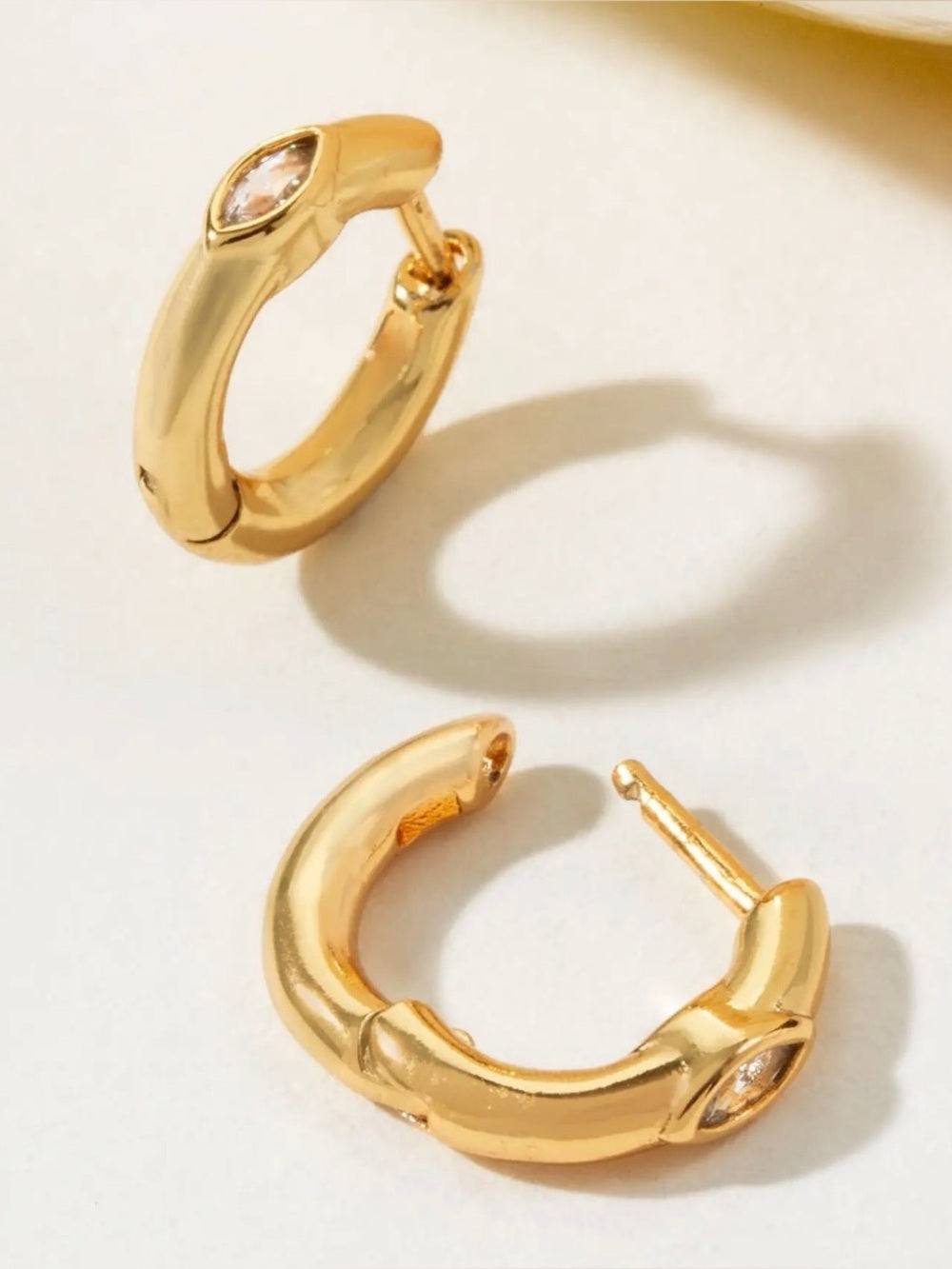 A713, Luna Norte Gold Marquise-Cut CZ Huggie Earrings