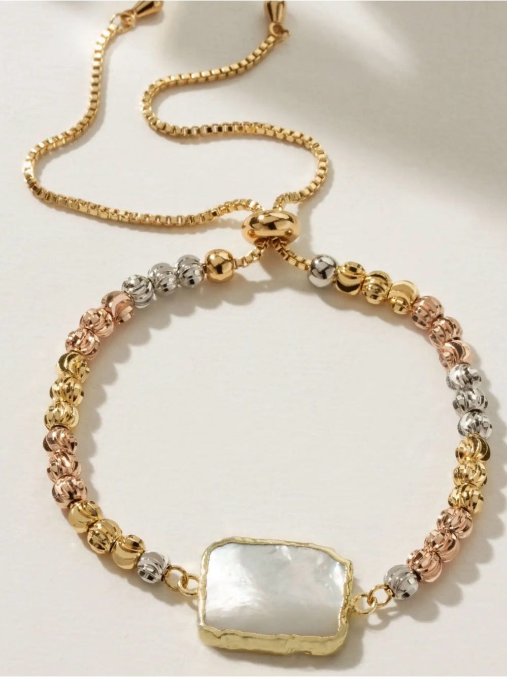 A714, Luna Norte Tri-Tone Gold Adjustable Bracelet with Mother of Pearl Center