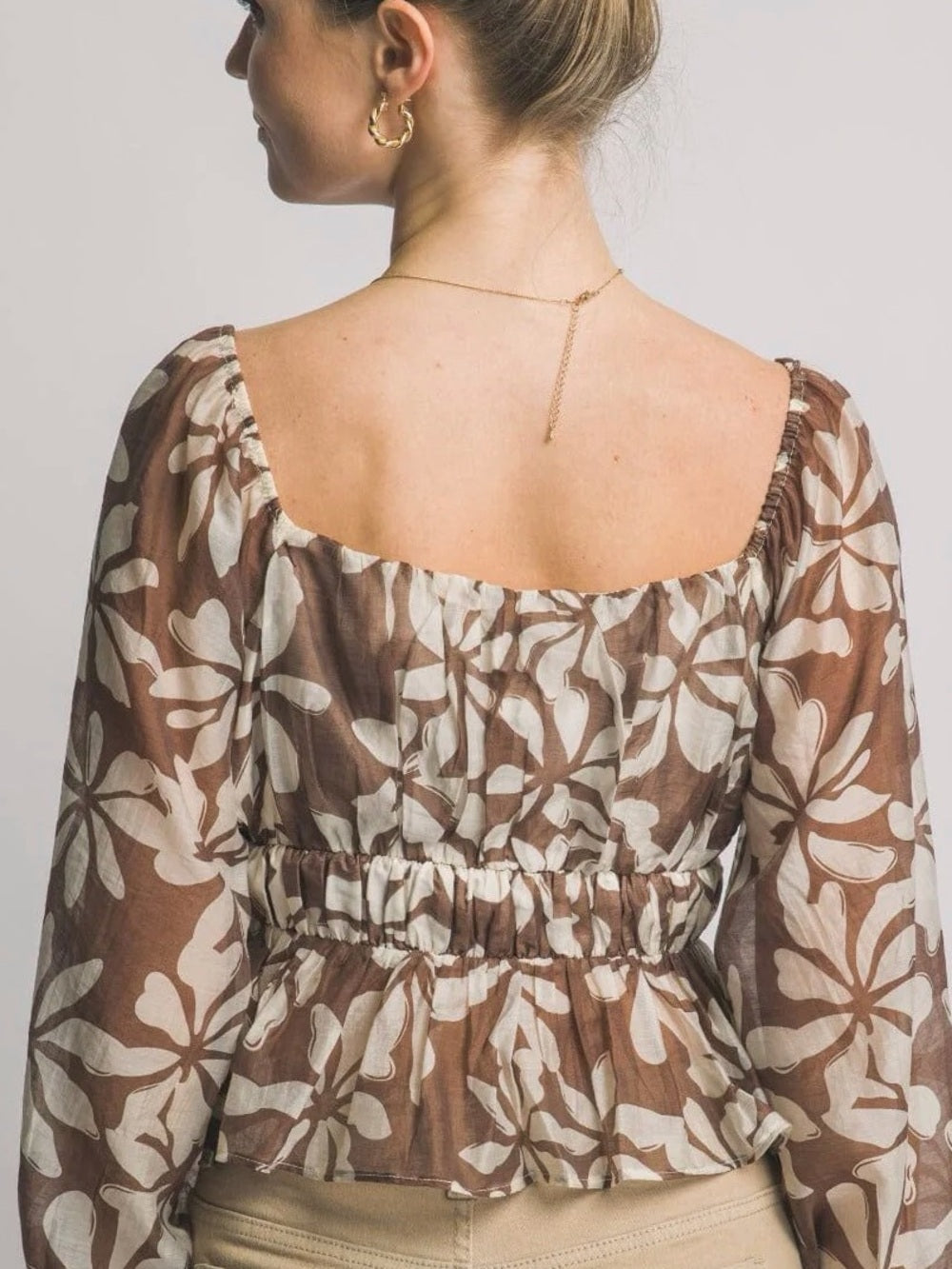 Square-Neck Floral Smocked Peplum Top in Brown and Cream