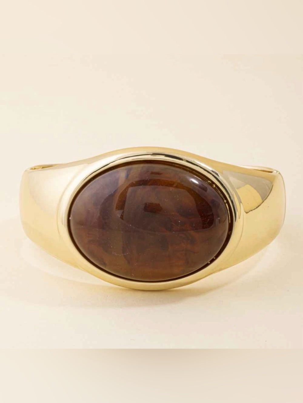 A482. Cuff Oval with Oval Brown Stone