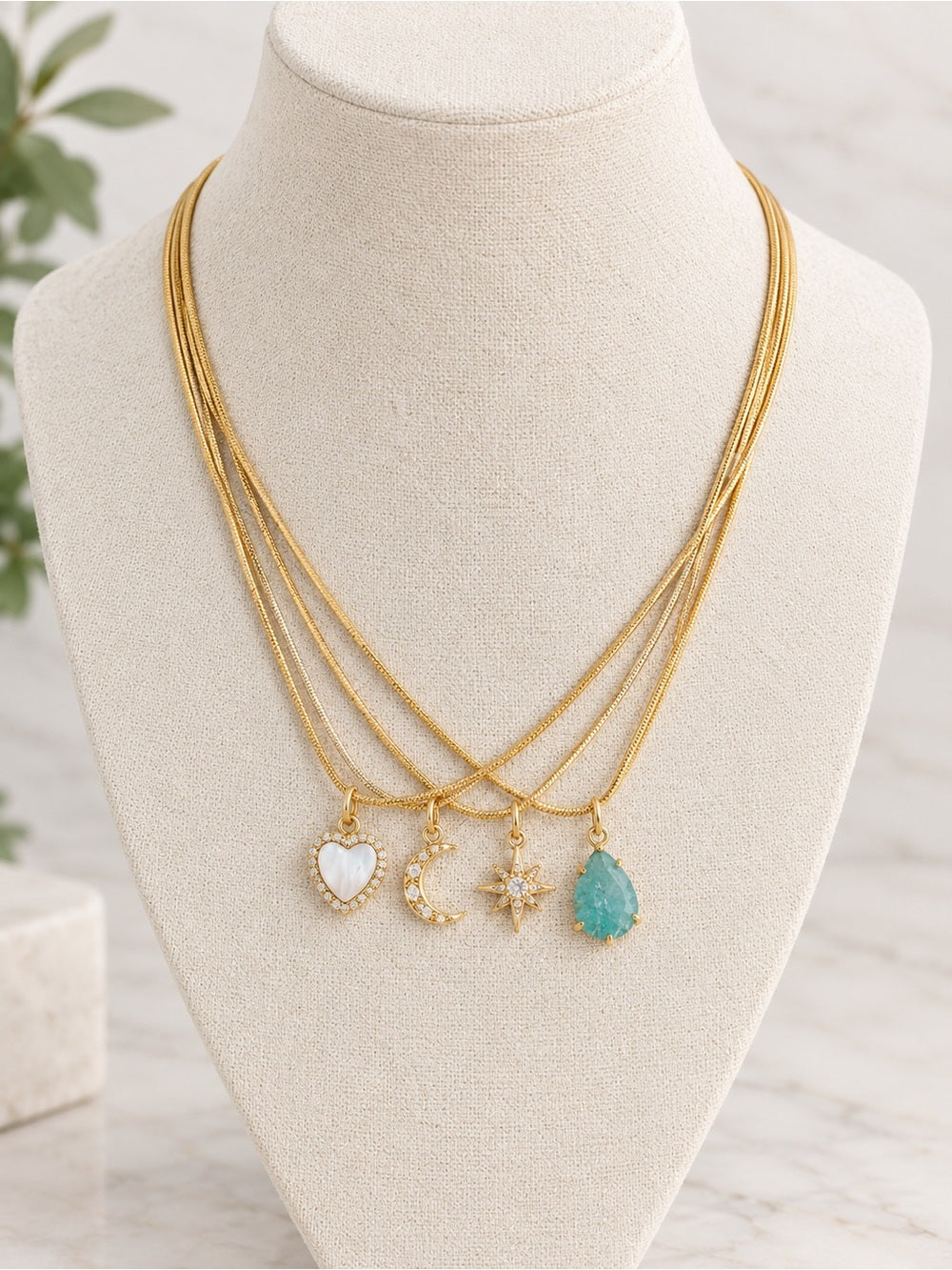 Luna Norte Gold Layered Pendant Necklace with Heart, Moon, Star & Teardrop