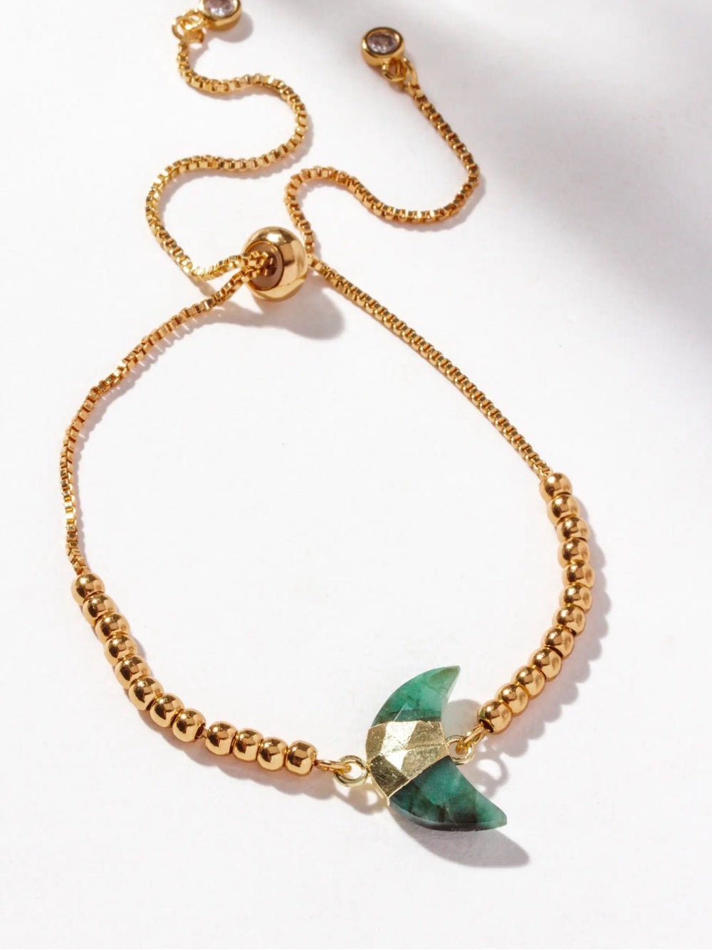 Luna Norte Gold Beaded Bracelet with Green Emerald Crescent