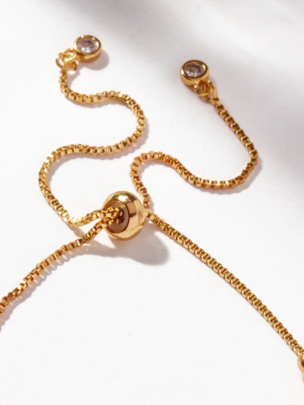 Luna Norte Gold Beaded Bracelet with Green Emerald Crescent