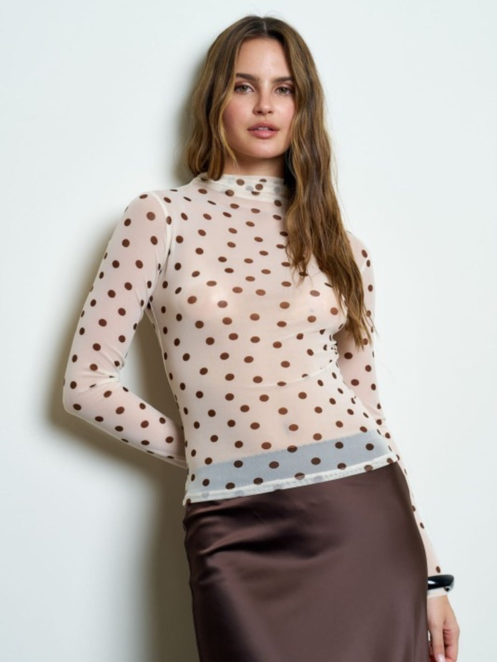 A581. Sheer Polka Dot Long-Sleeve Mesh Mock Neck Top - Cream with Brown Dots