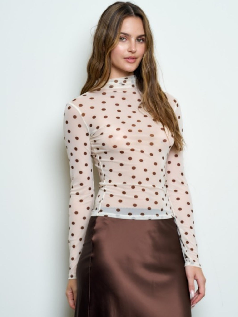 A581. Sheer Polka Dot Long-Sleeve Mesh Mock Neck Top - Cream with Brown Dots
