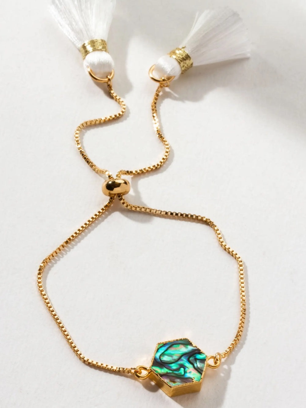 Luna Norte Gold-Plated Abalone Hexagon Bracelet with White Tassels