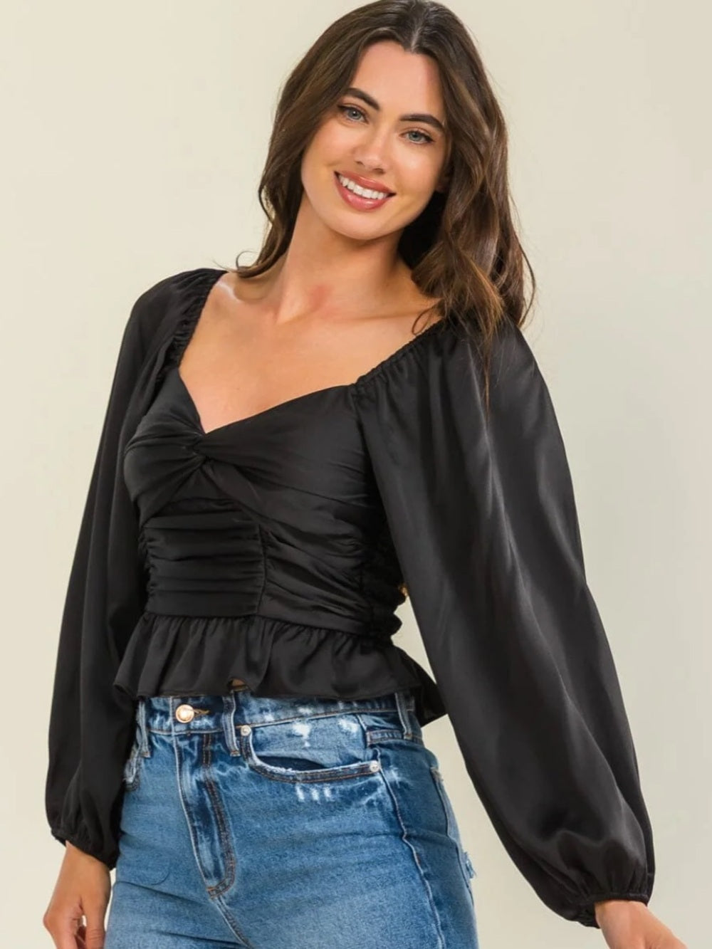 A641. Black Puff-Sleeve Ruched Peplum Top